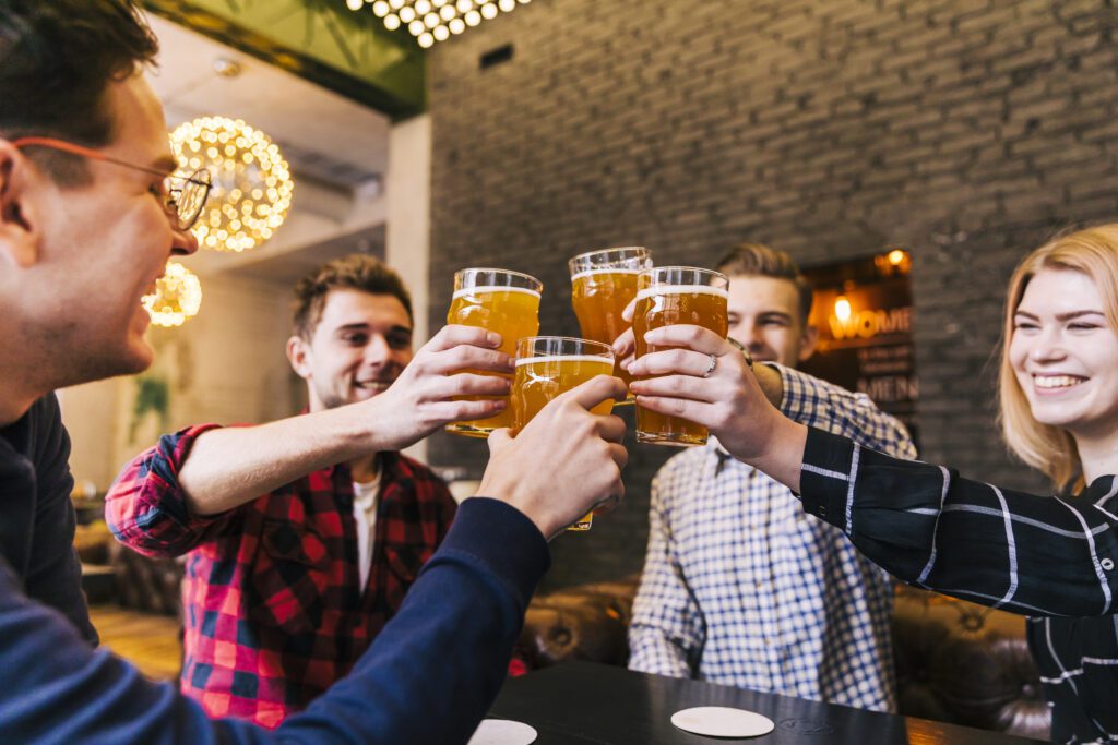 group-of-friends-drinking-beer-in-the-netherlands-at-a-bar